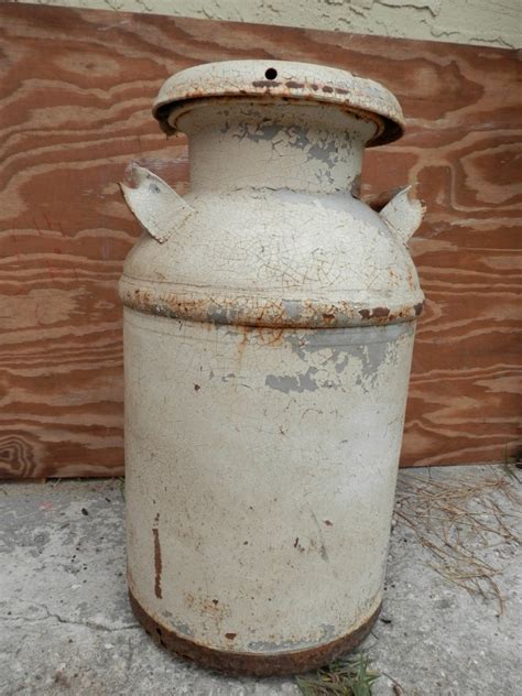 old metal milk container